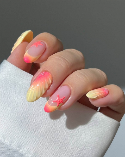 Neon pink and butter yellow roundtip acrylic nails with seashill gel texture art and starfish designs.