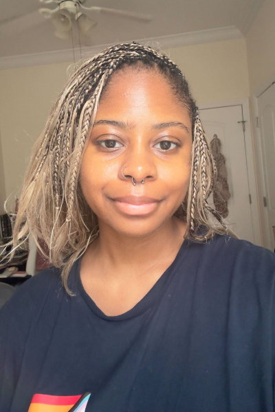 Image may contain Adult Person Hair Appliance Ceiling Fan Device and Electrical Device