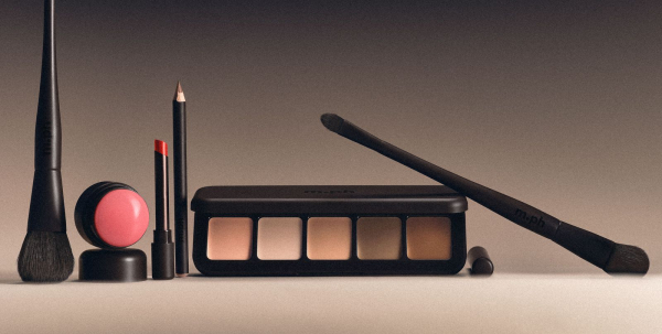 Image may contain Cosmetics Lipstick Brush Device and Tool